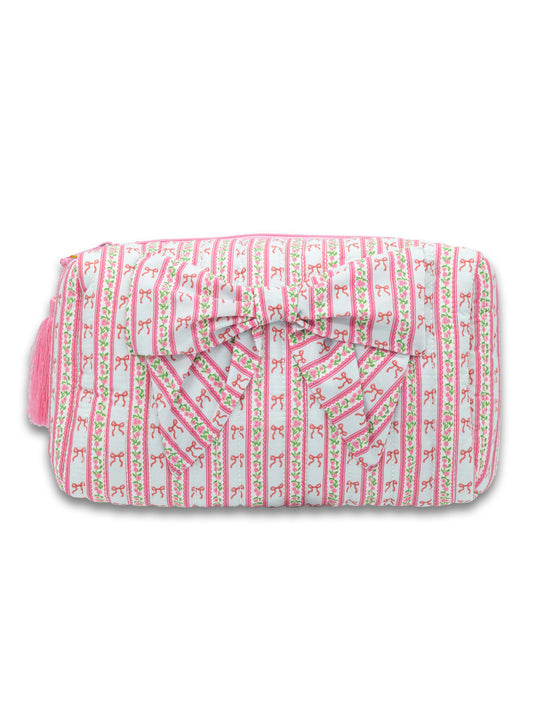 Rectangular makeup bag with pink and green floral stripes, large front bow, pink side tassel. Available in one size.