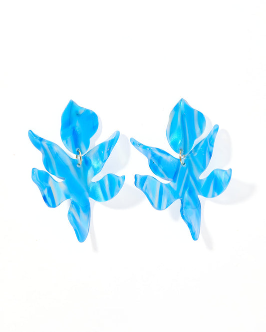 Blue and white marbled floral statement earrings with leaf shapes and wavy edges. Available in small, medium, and large sizes.