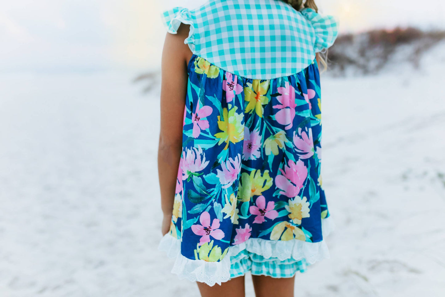Girls Jade Floral Short Set with blue, pink, yellow, and green floral patterns, green-white checkered collar. Sizes: 2T-7.