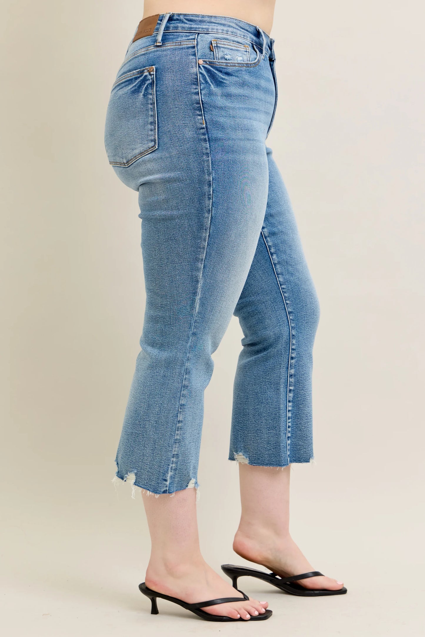 Judy Blue MR Vintage Wash Destroy Hem Kick Flare Jeans, light blue, raw frayed hems. Available in sizes 0-20W.