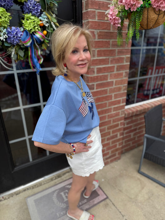 Liberty Bow Flags Luxe Top featuring patriotic bows. Available in sizes XS-XL.