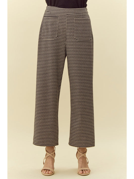 Houndstooth Check Wide Leg Pants feature a black and white checkered print with wide flared legs. Available sizes: XS, S, M, L, XL.