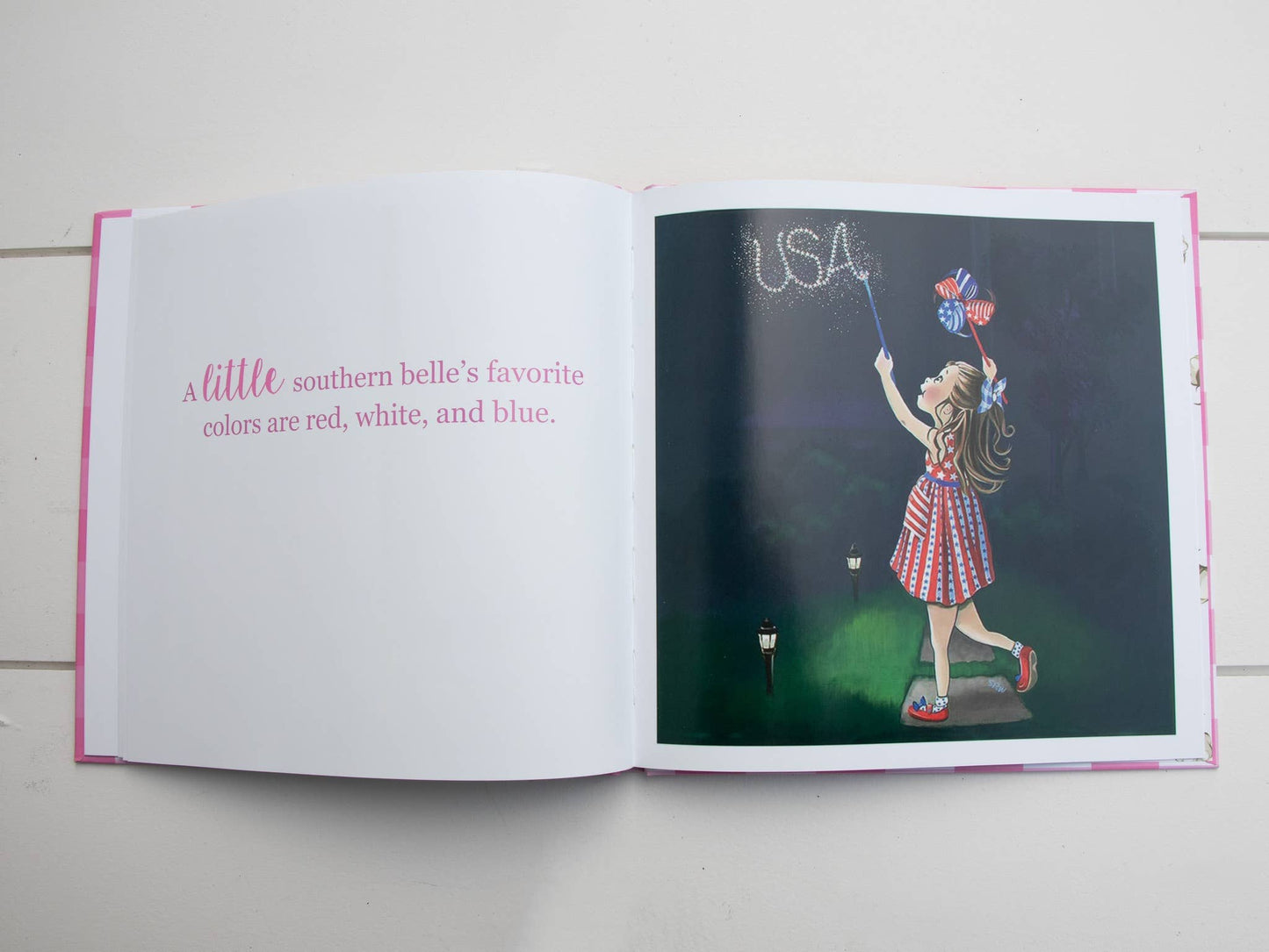 Open "Little Southern Belle" book. Text about favorite colors. Sizes: standard children’s book dimensions.