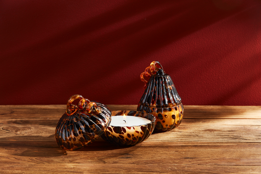 Tall Tortoise Pumpkin Candle in a brown and black spotted glass jar, white wax inside. Available in multiple sizes.
