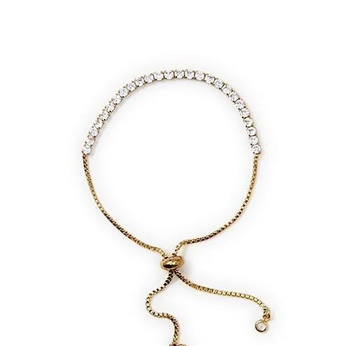 Clear, round-cut rhinestone Dazzle Bracelet with adjustable sliding clasp and loose chain ends. Available in one size fits most.