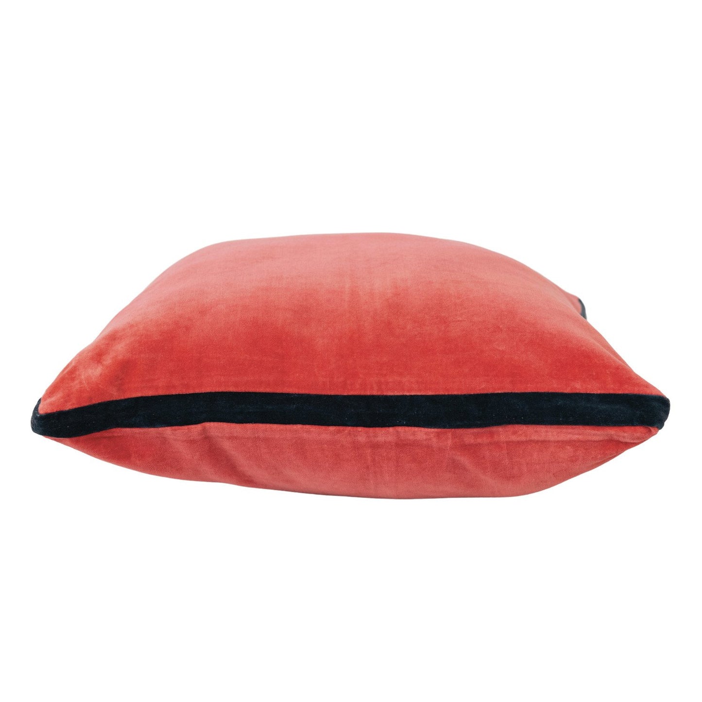 20” square cotton velvet pillow in soft coral with a black edge. Available in 20” size.