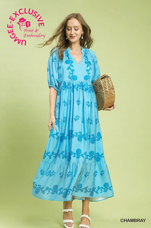 Chambray Vine Stippling Print Maxi Dress with delicate floral embroidery and intricate vine stippling print. Available in sizes XS–XL. Text: "UNIQUE EXCLUSIVE Print & Embroidery.