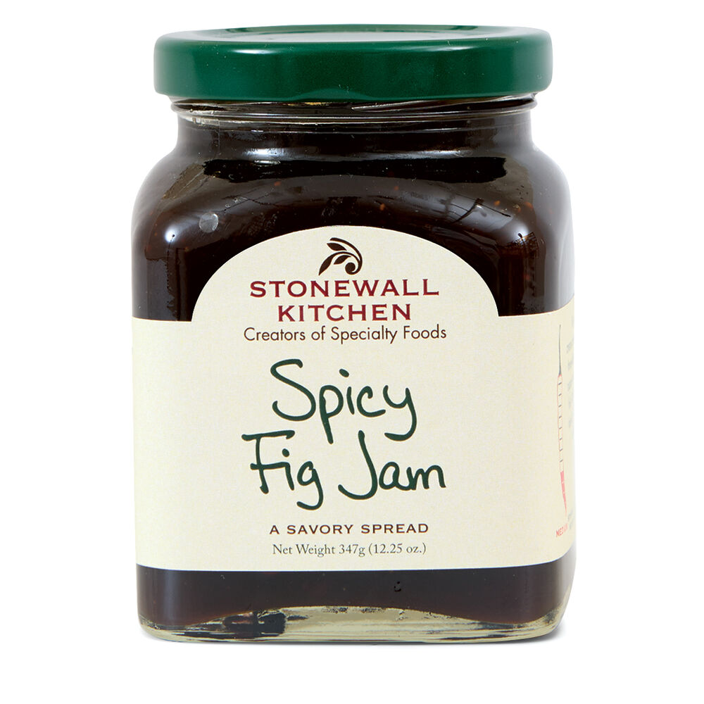 Glass jar with green lid labeled "Spicy Fig Jam 12.25 oz" containing dark, spicy jam. Net weight: 12.25 oz (347g).