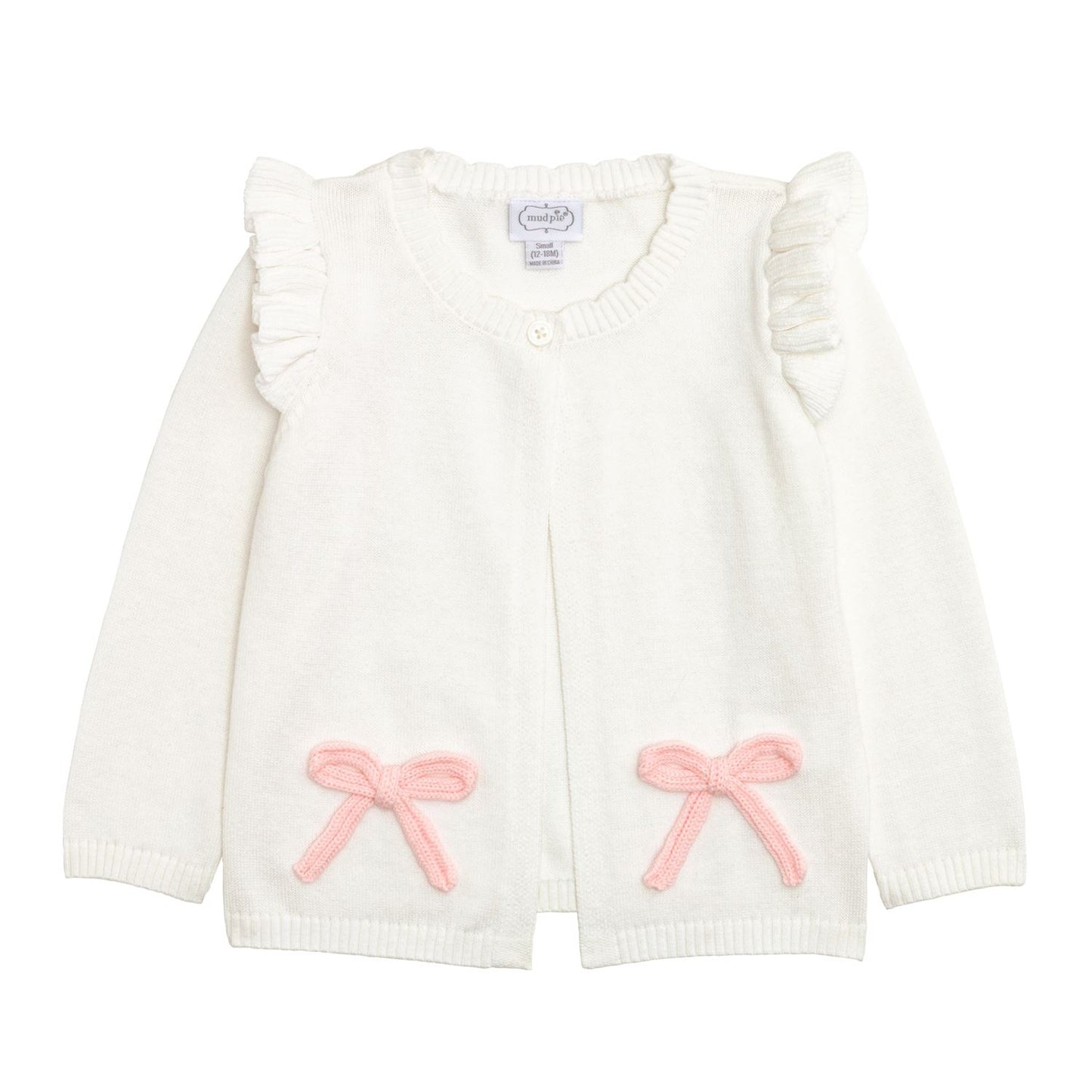 Pink cotton baby cardigan with ruffled shoulders, crochet bows on pockets, long sleeves, single neck button. Sizes: NB-24M.