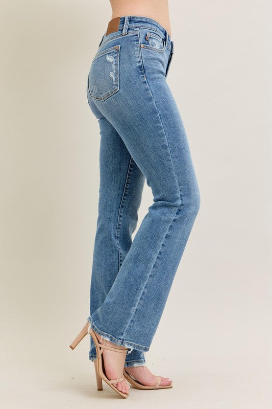 Judy Blue Vintage Wash Boot Cut Jeans, high waist, light blue, slight back pocket distressing, frayed hems. Sizes: 0-24.