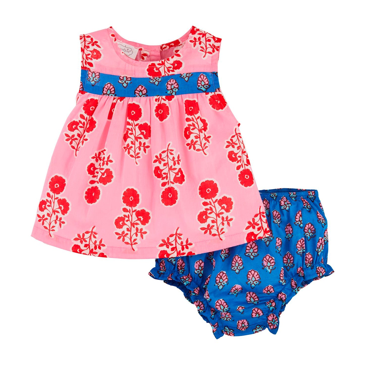 The Mixed Block Print Pinafore Set features a pink sleeveless baby dress with red floral patterns and a blue band, made from cotton voile, plus matching blue bloomers. Available in sizes 0-3M, 3-6M, 6-9M, and 9-12M.
