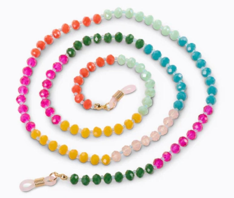 The Peepers Beaded Chain is an eye-catching necklace with a spiral pattern of round, faceted beads in bright pink, orange, green, yellow, blue, and red. It is secured with a clasp at one end. Available size: 30 inches.