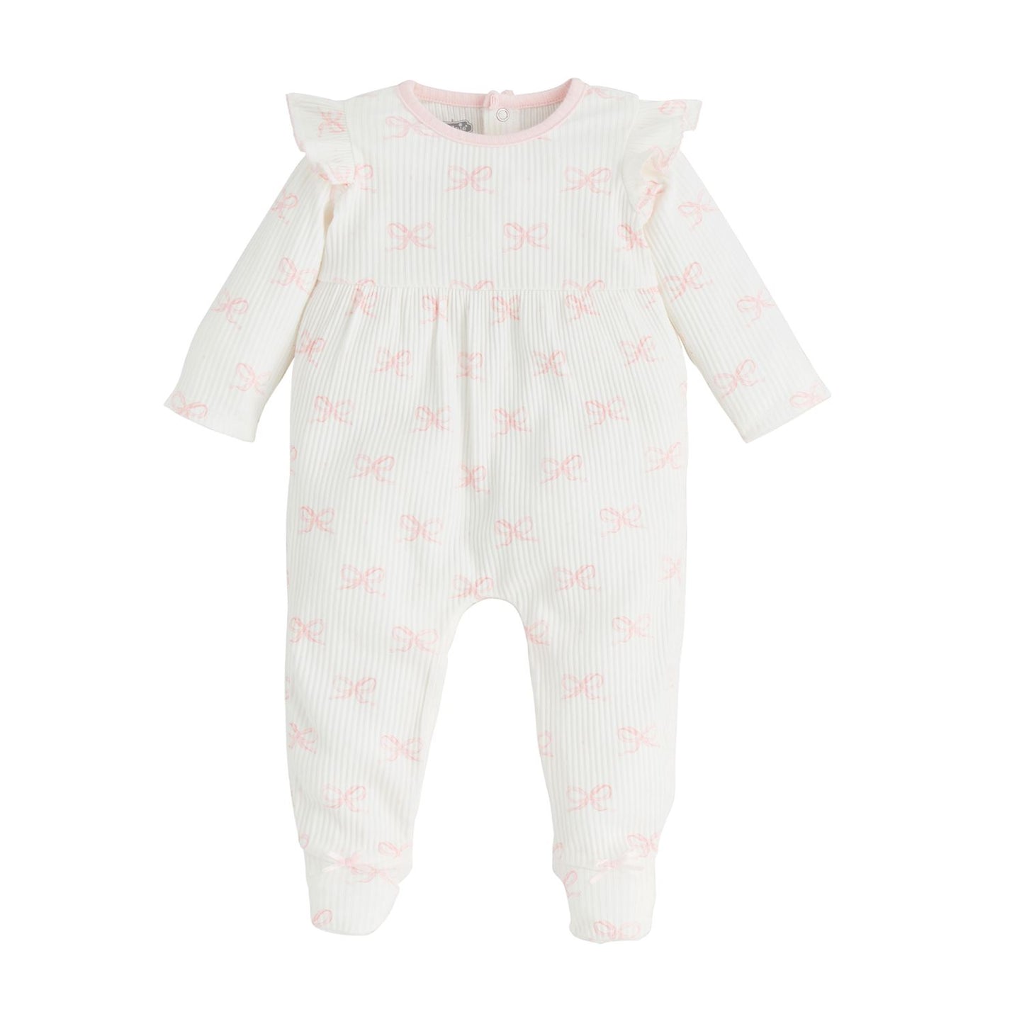 The Ruffle Bow Baby Sleeper is a white long-sleeve onesie featuring ruffled shoulders, pink bow patterns, snap buttons at the back, and a light pink-trimmed neckline. Available in sizes: Newborn, 0-3M, 3-6M, 6-9M.