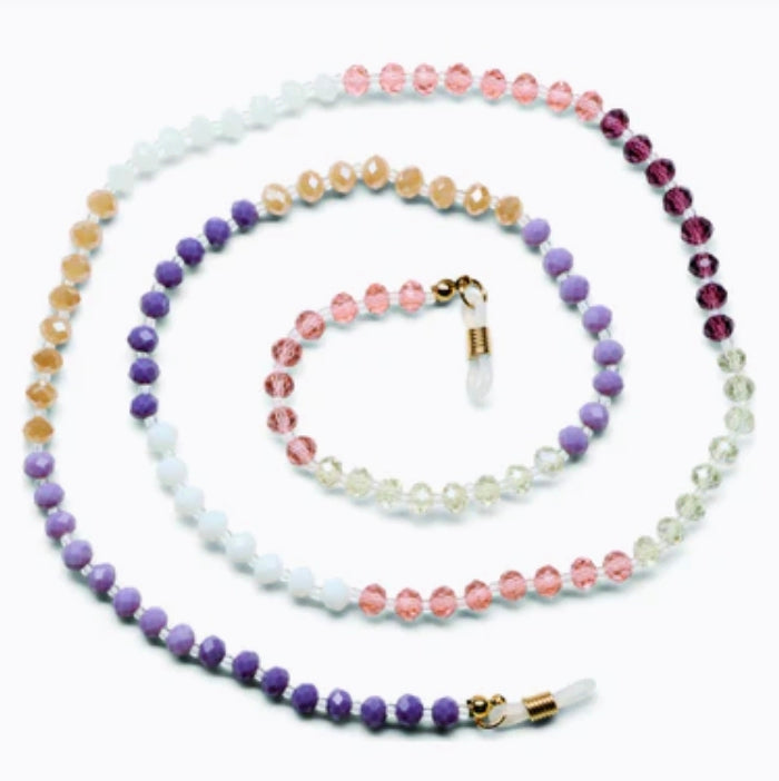 Peepers Beaded Chain: rainbow-inspired eyewear chain with faceted beads in purple, white, peach, pink, and burgundy in a spiral design. Available in one size.