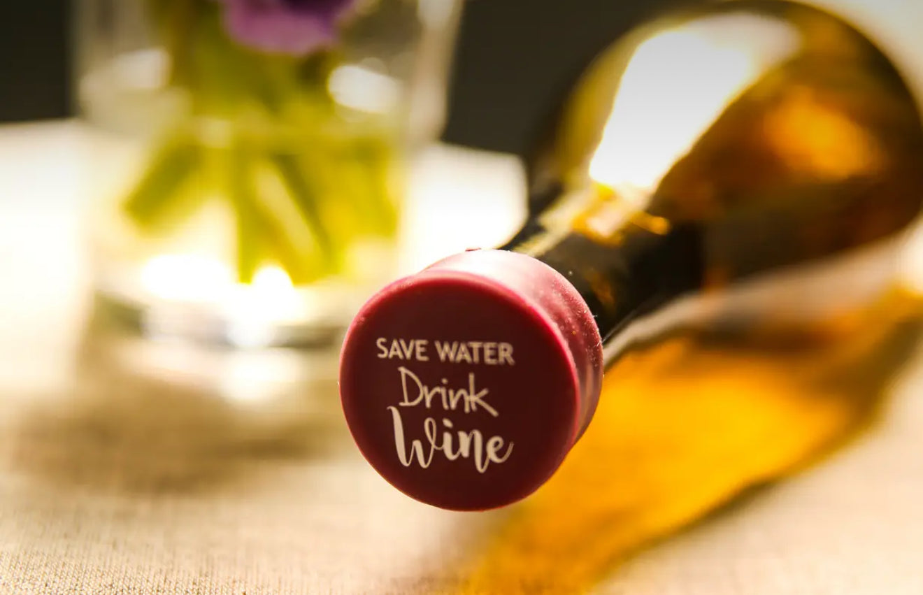 Wine Cap with "SAVE WATER Drink Wine" text, fits standard wine bottles, available in small and large sizes.