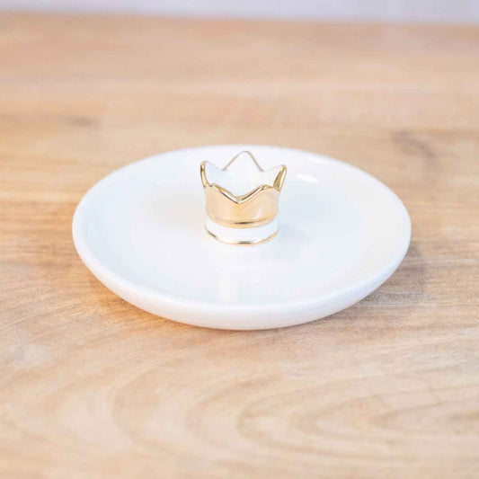 The Her Highness Trinket Dish is a small white jewelry organizer with a gold crown holder for accessories. Available Size: Small.
