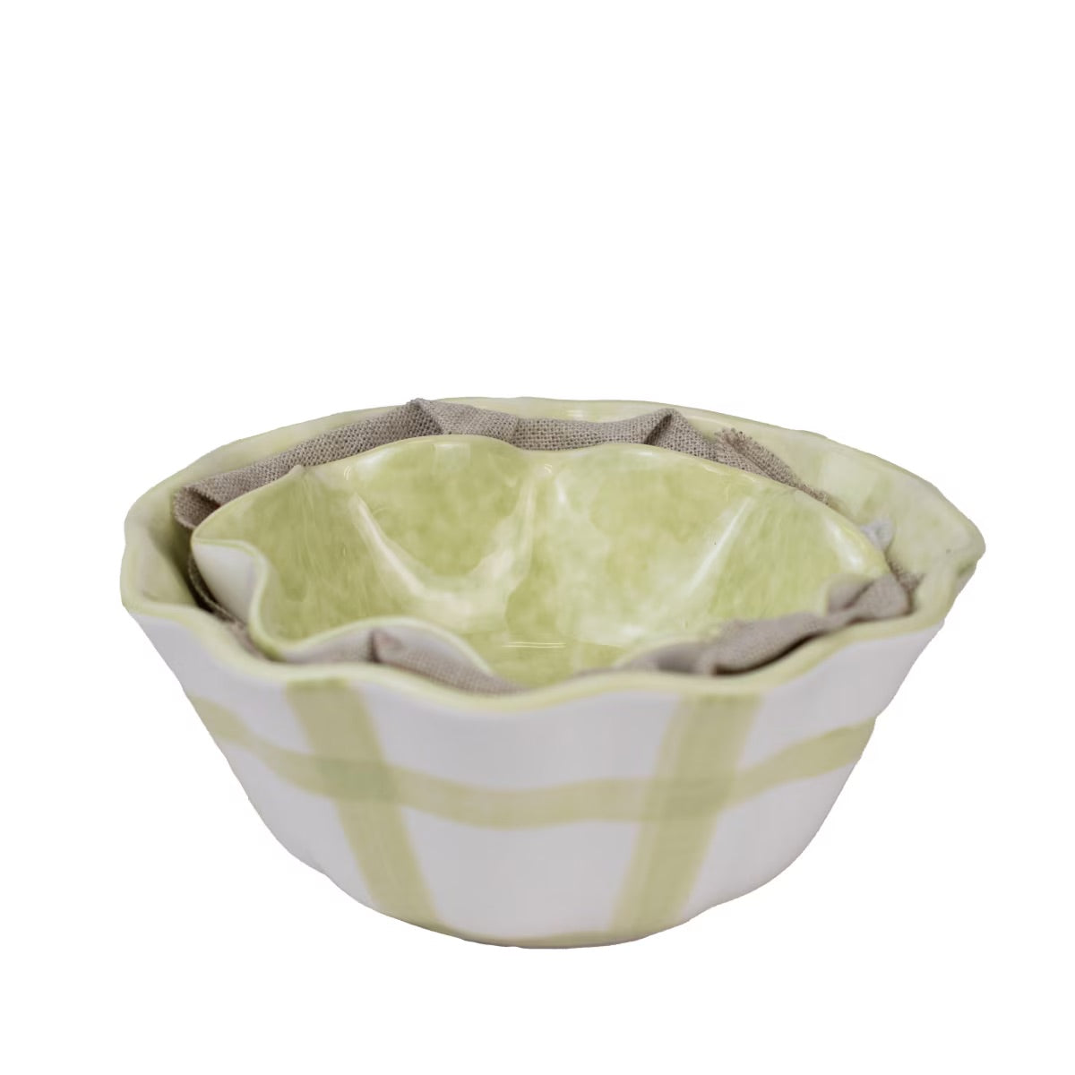 The Gingham Ruffle Nesting Bowls, Set of 2, feature ruffled edges and include a white outer bowl with green plaid and a textured light green inner bowl. Microwave and dishwasher safe. Sizes: Outer bowl - 8" diameter, Inner bowl - 6" diameter.