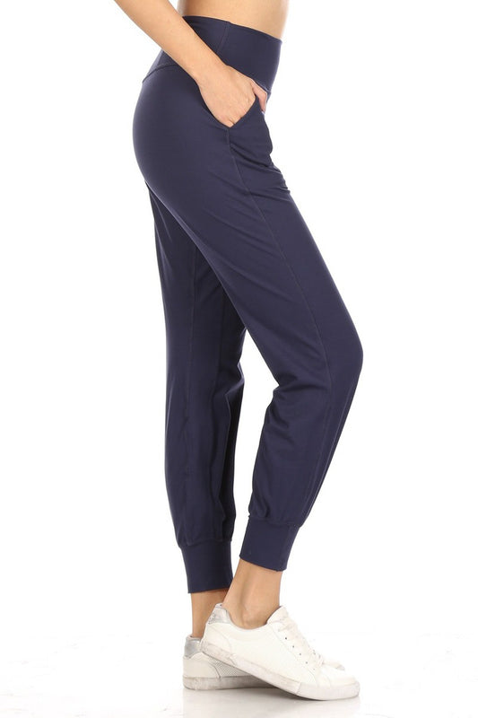 The Everyday Flex Pants are navy blue in color and feature a waistband pocket. The sizes available for this product range widely.