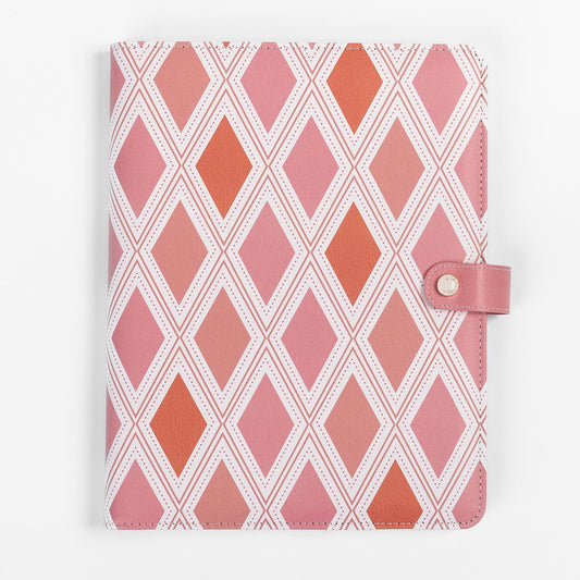So Darling large vegan leather portfolio with a place for your pen notepad and a closure with a button the pattern on the outside is diamond pink and orange with pink cross lines