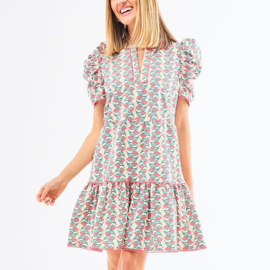 Adelyn Honey Vines Coral Dress with ruched sleeves, ruffled hem; available in sizes XS–XL.