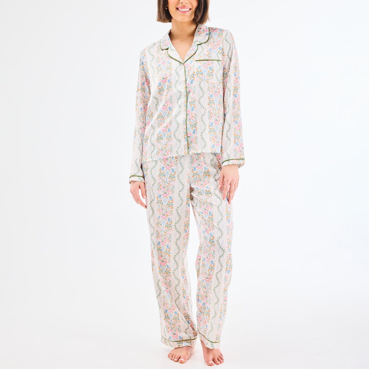 Charlotte Ivy Lane Ivory Pant Set: Long-sleeved button-up top and adjustable drawstring pants in breathable fabric with light floral print. Available in sizes XS–XL.