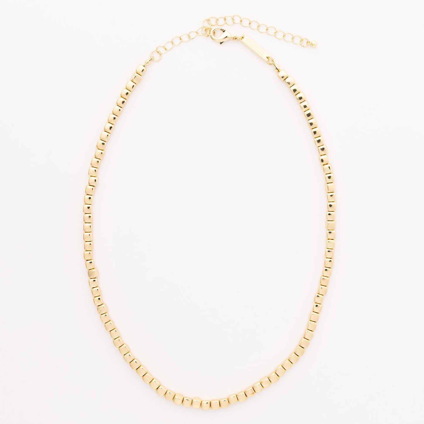 Delicate gold chain with small square beads and adjustable clasp. Available in 16", 18", and 20" lengths.