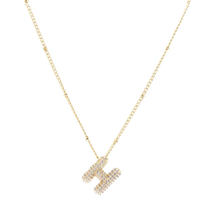 The Chloe Necklace features an "H" pendant with small diamonds, plated in 18K gold. Available sizes: 16-18 inches adjustable chain.