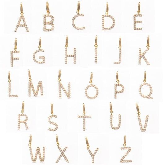 Gold pendants shaped like letters A to Z with small white gemstones. 18K gold-plated. Suitable for Luxe Clip-On Charm Necklace Bar. Sizes available: Standard charm size.