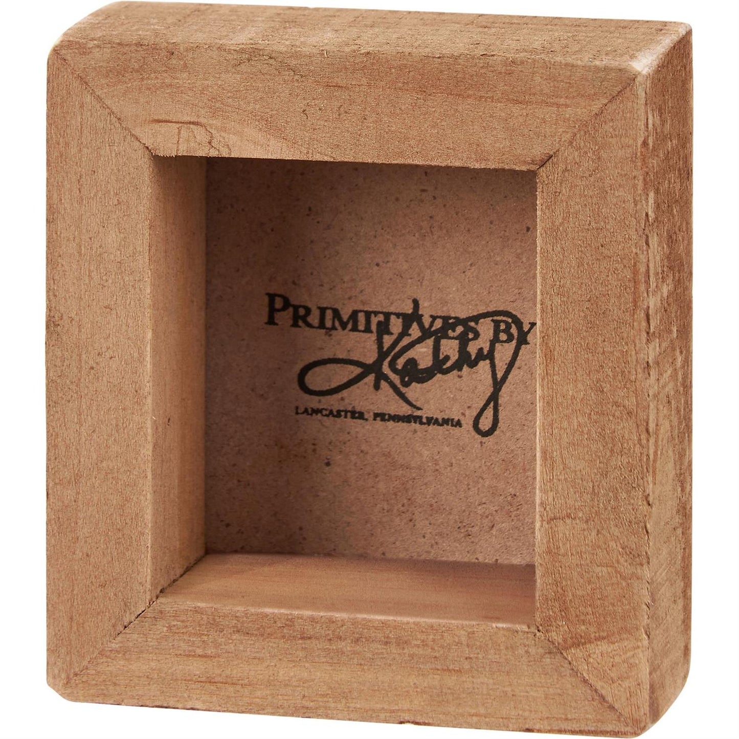 The Mini Best Dad Ever Box Sign is a wooden shadow box frame featuring visible grain, a recessed back, and an open front. Available in one size.