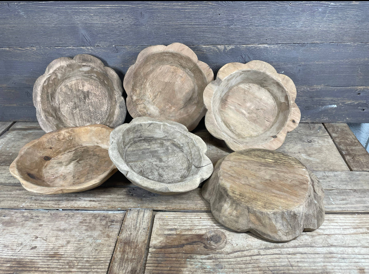 Set of six small, handmade flower-shaped dough bowls. Available sizes: 4", 6", and 8". Petal-edged design shown.