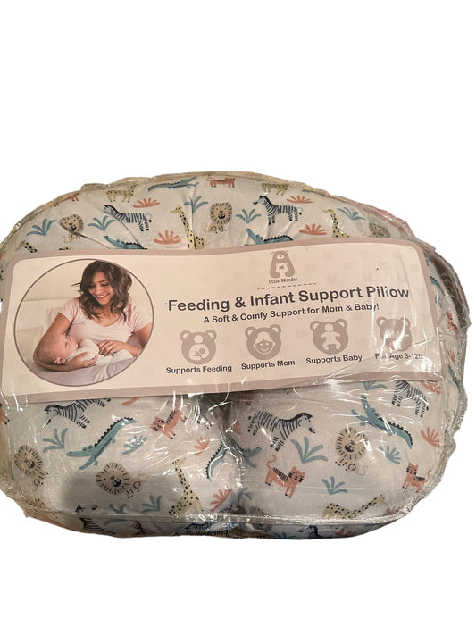 feeding and infant support pillow featuring zoo animals
