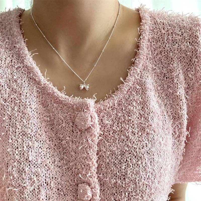 Dainty Bow Tie Bowknot Charm Necklace in 925 Sterling Silver. Available sizes: 16", 18", and 20".