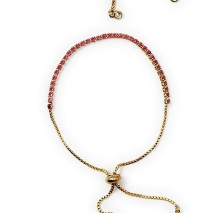Delicate gold adjustable bracelet with pink gemstones, sliding clasp, chain ends. Available sizes: S, M, L.