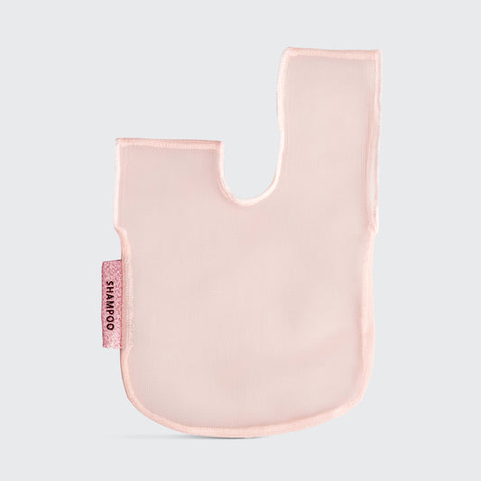 Light pink, translucent mesh glove with rounded bottom, top cutout, and pink "SHAMPOO" tag. Available in multiple sizes.