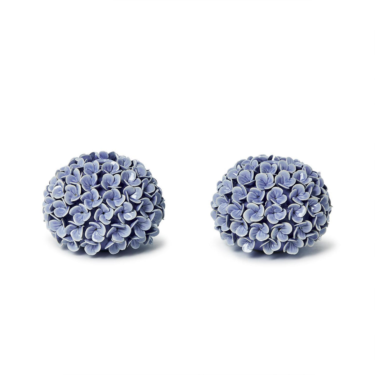 Porcelain hydrangea bud vase/taper holder, pale blue petals, spherical. Sold individually. Available in one size.