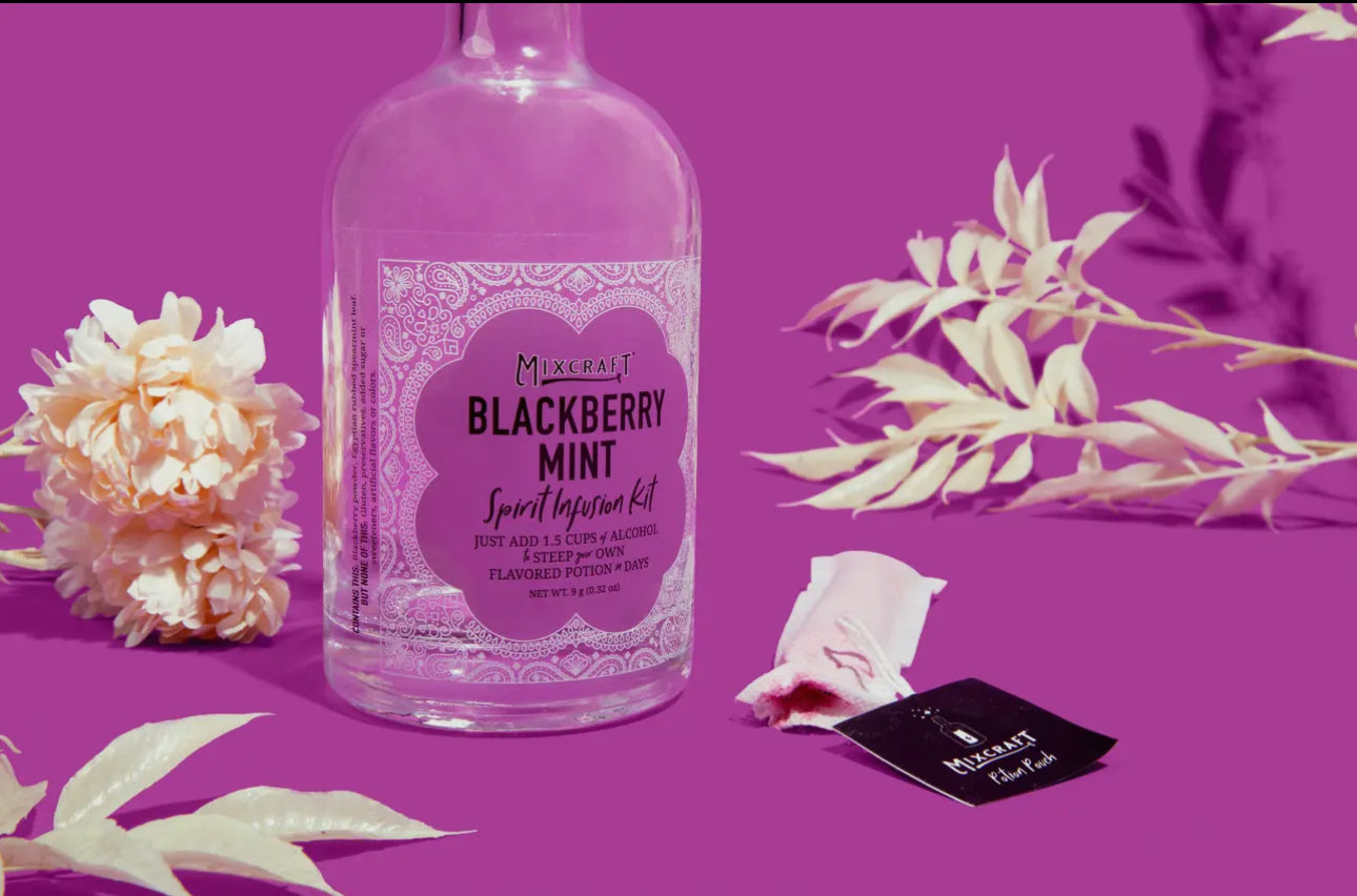 Clear bottle labeled “Spirit InFusion Kit”—an all-natural fruit alcohol infusion kit. Available in 8oz and 16oz sizes.