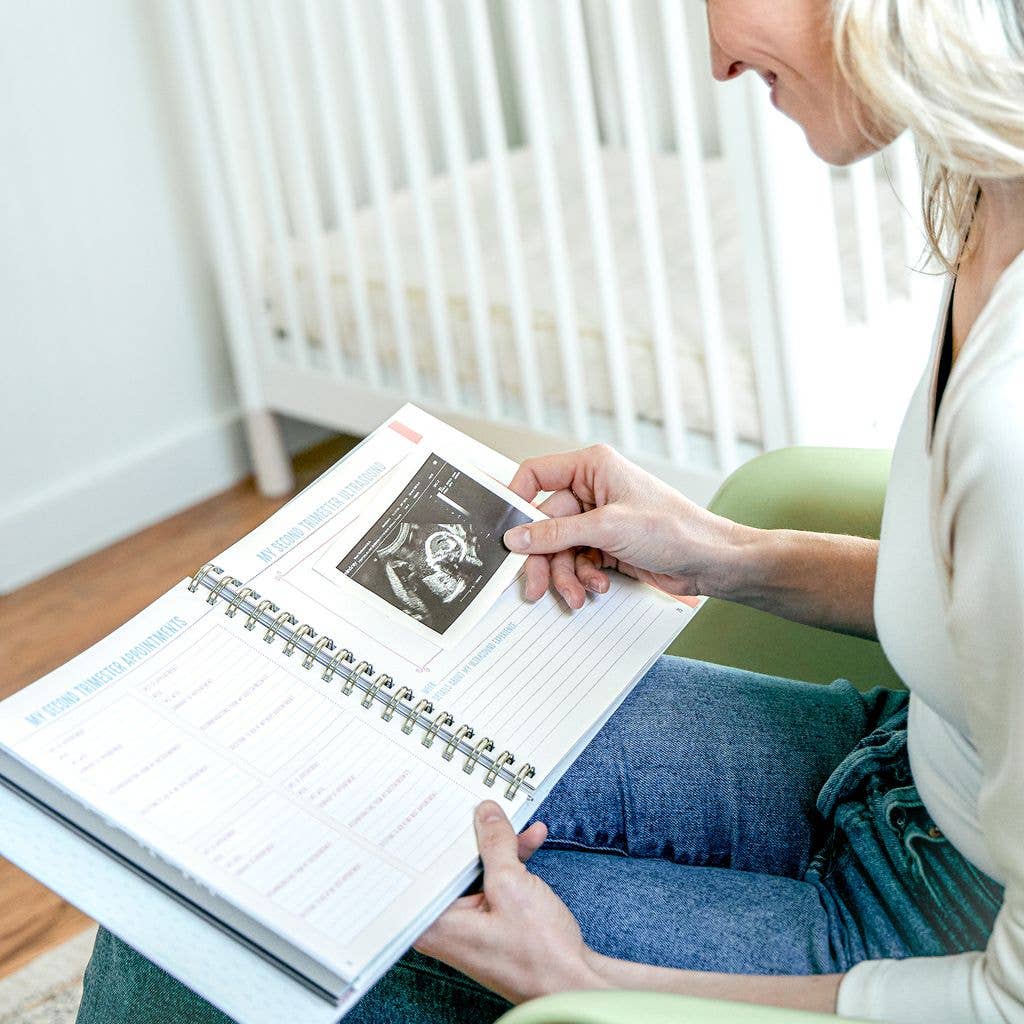 Bump for Joy: A Pregnancy Journal (Blue) shown open to sonogram page. Available in standard size.