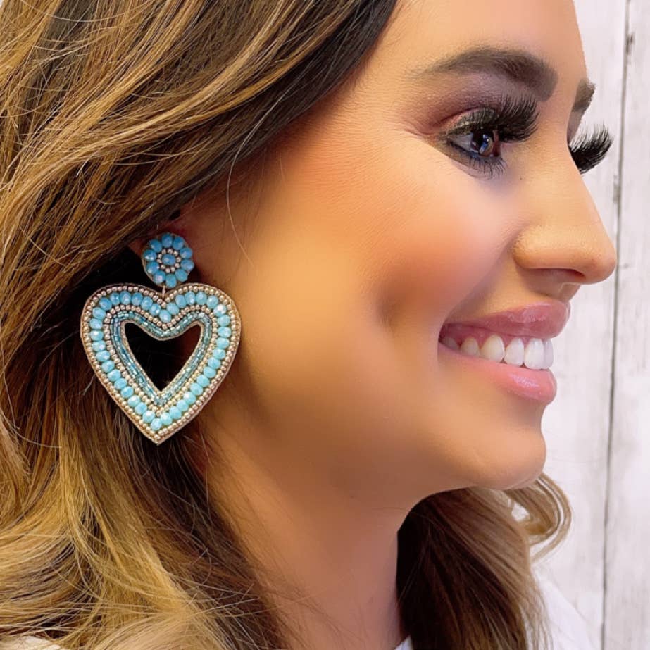 Blue Heart Earrings with seed beads and floral accent at top; available in small, medium, and large sizes.