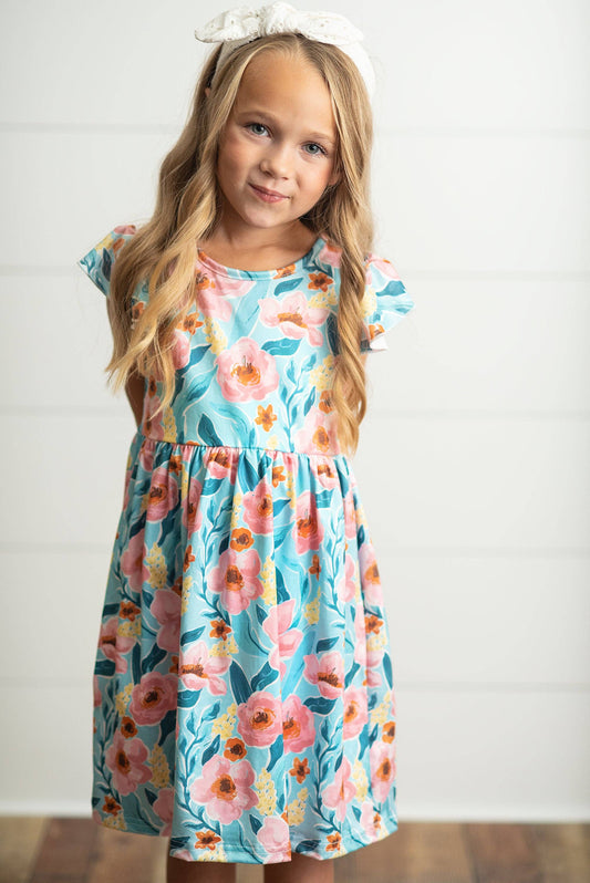 Girls Claire Pink Floral Print Twirl Dress, available in sizes 2T-10, features a soft pink floral pattern and twirl-ready skirt.