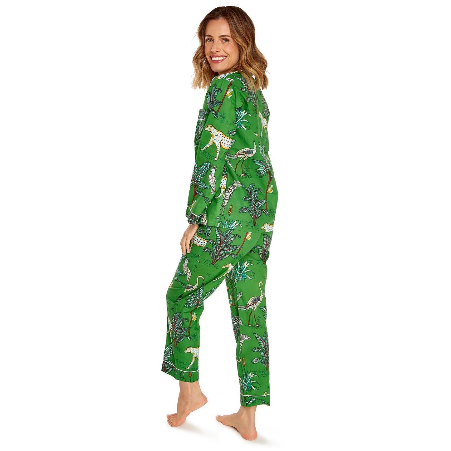 Green cotton printed pajamas with leopard and leaf pattern. Available in sizes S, M, L, XL.