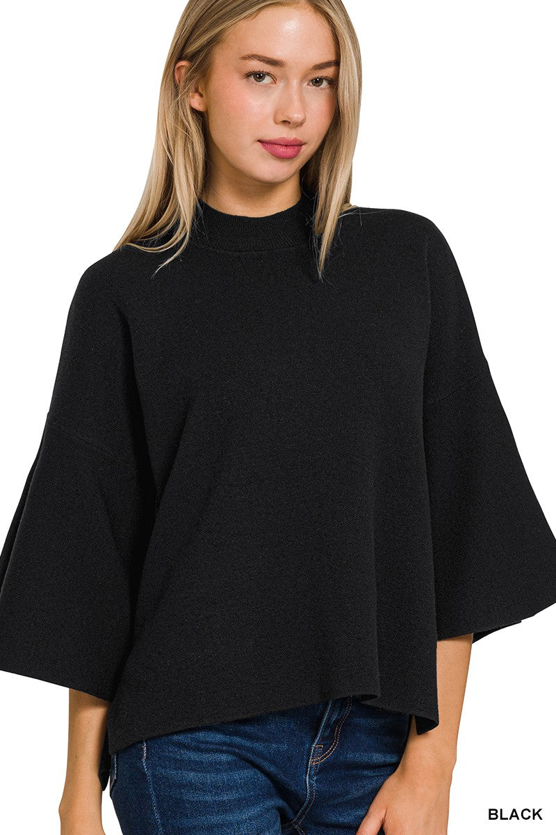 The Viscose Bell Sleeve Sweater is available in sizes small, medium, large and extra-large. This product features wide, flowing sleeves.