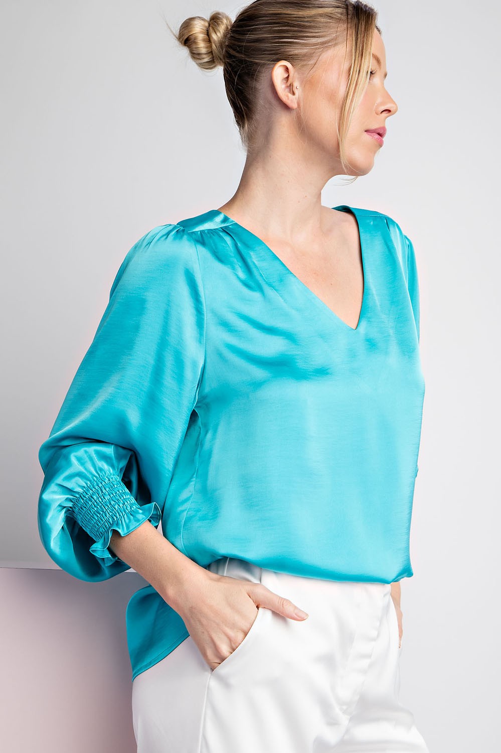 Aqua Satin V-Neck Bubble Sleeve Blouse with gathered cuffs. Available in sizes XS-XL.