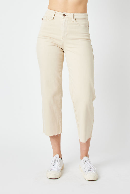 Bone colored Tummy Control Wide Leg Crop Pants, comes in sizes 3 to 20W comes in light beige and medium pink. I turn these mid rise jeans have a single button two pockets on the front two pockets on the back and it comes in a Capri length with roughed hem