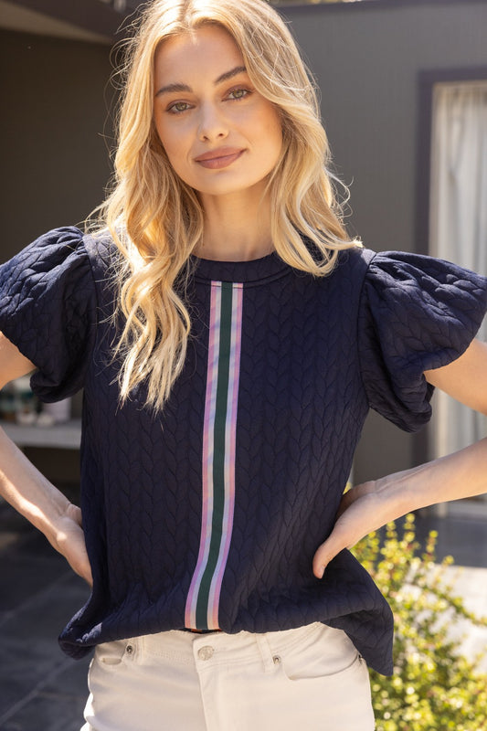 **Navy Blue Stripe Front Textured Knit Top**
- Features: Short puff sleeves, vertical stripe design in pastel colors
- Fabric: Comfortable and stretchy
- Available sizes: XS, S, M, L, XL