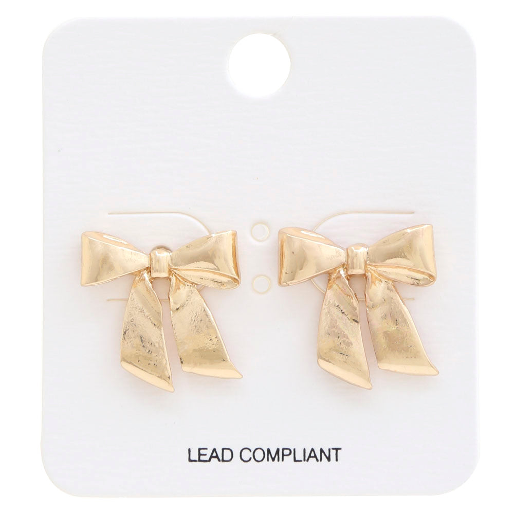 Rhinestone & Metal Bow Earrings crafted from gold metal and embellished with rhinestones. Sizes available: one size.