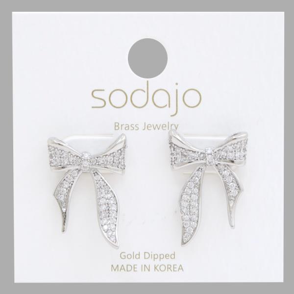 Rhinestone & metal bow earrings with clear stones, gold dipped. Sizes available: not specified.
