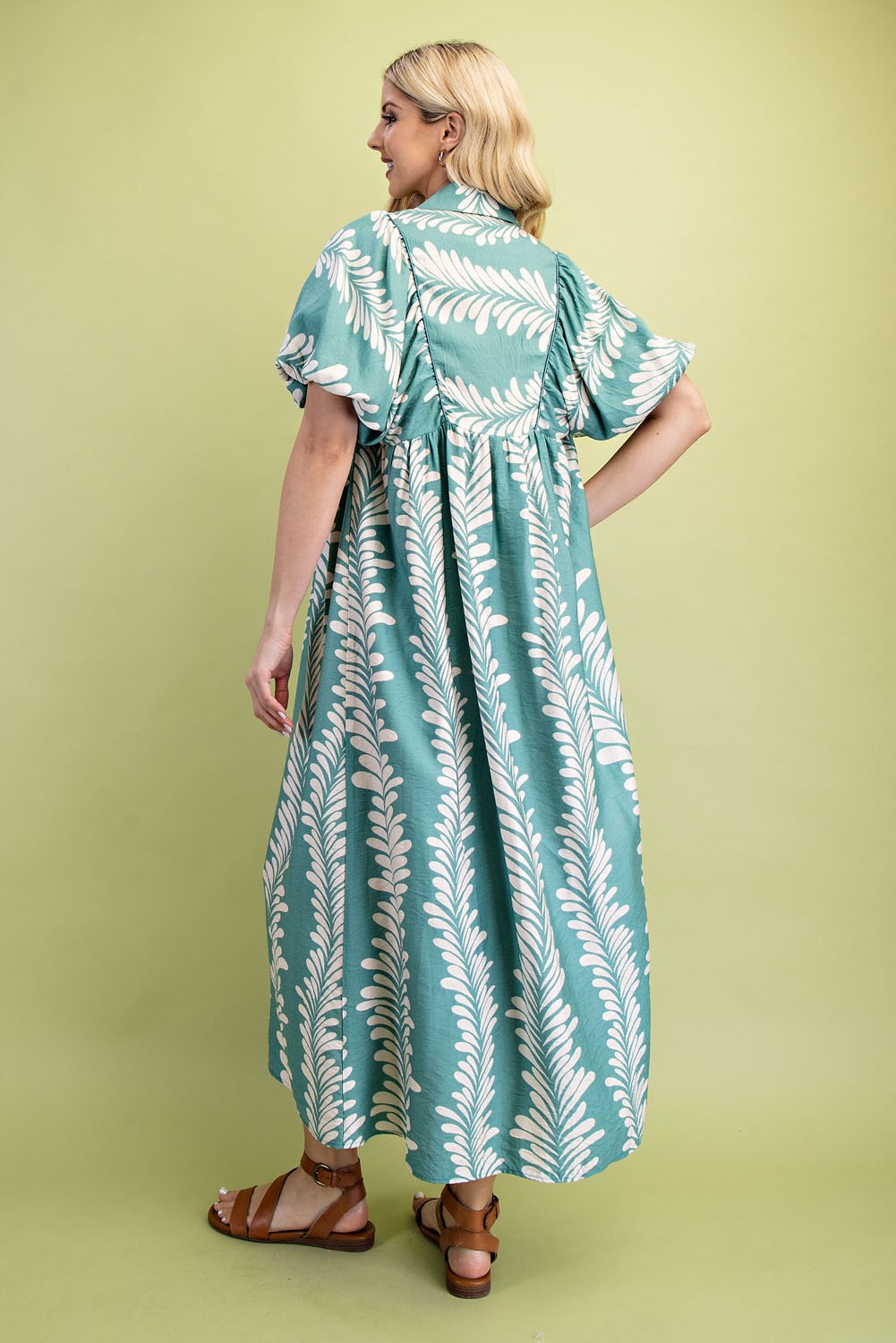 Printed Short Puff Sleeve Midi Dress in teal with white leafy pattern, available in sizes XS-XL.