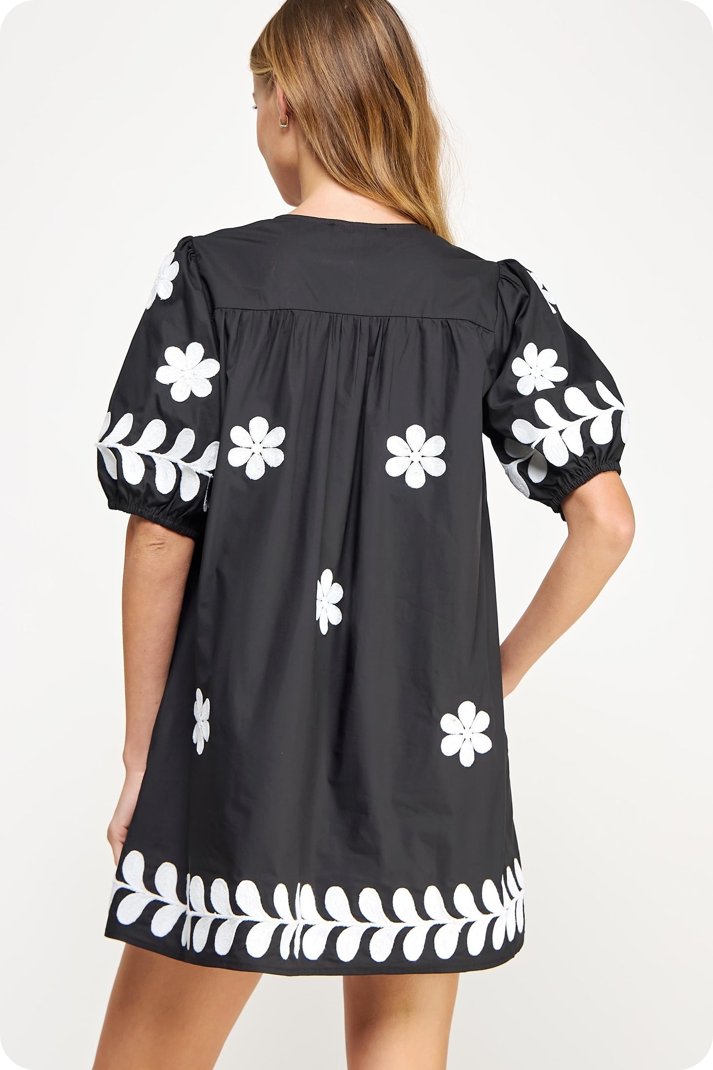 Ebony Blossom Embroidery Cotton Dress with white floral embroidery, loose babydoll silhouette, puffed sleeves. Sizes XS-XL available.