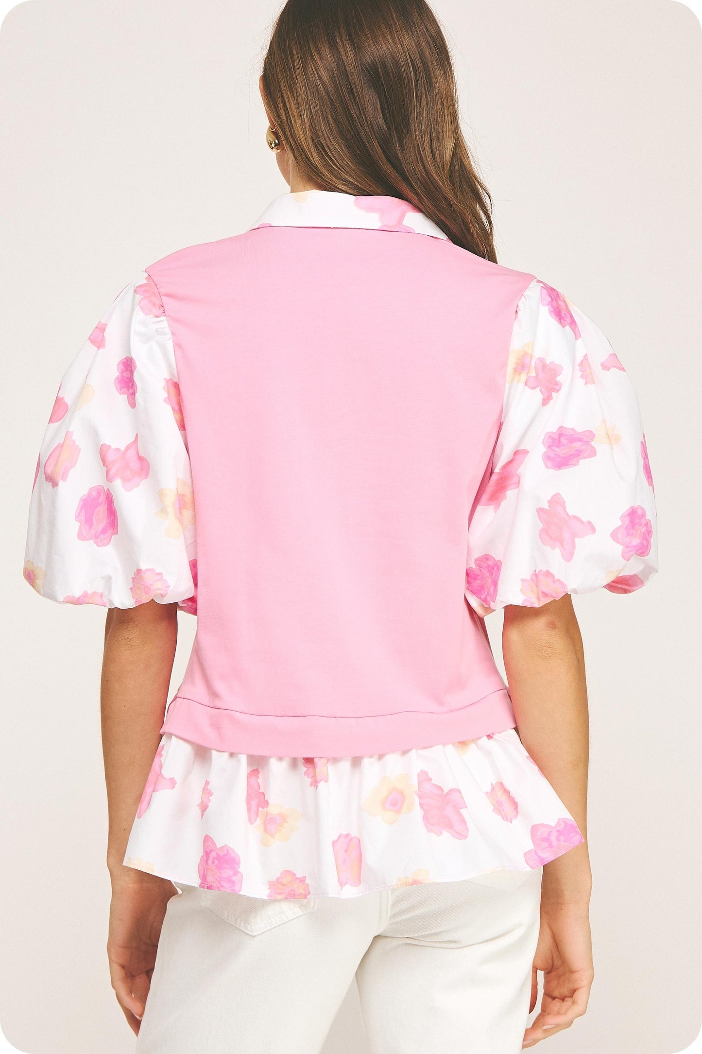 Floral Print Sleeve Knit Top with puffed sleeves and ruffled hem. Available in sizes XS–XL.