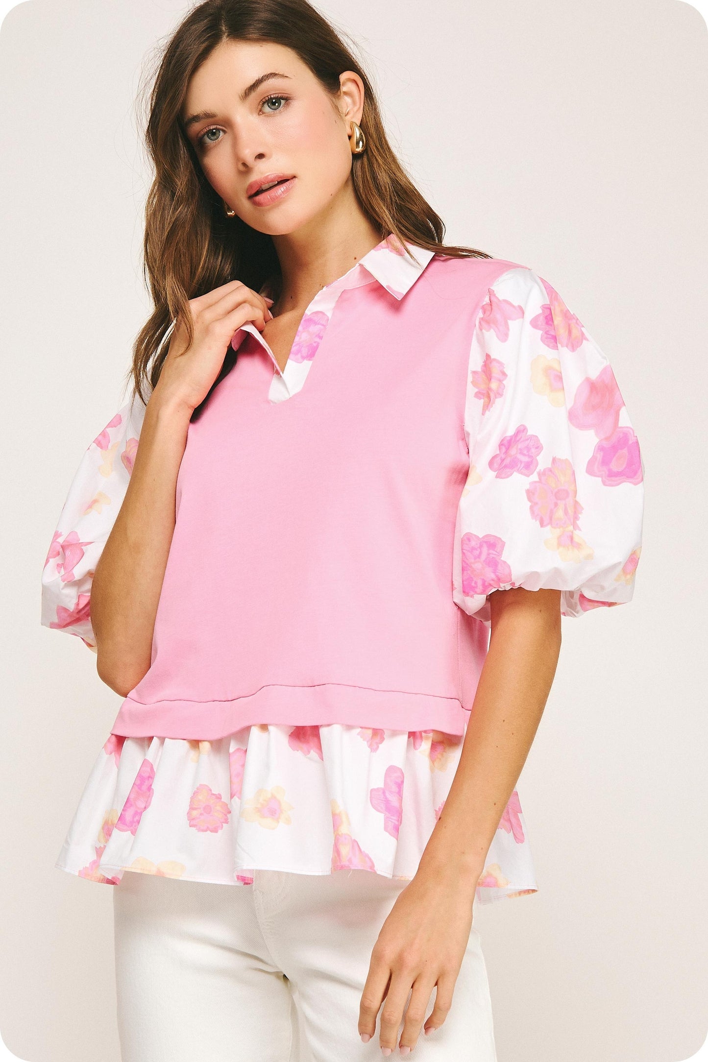 Floral Print Sleeve Knit Top with pink mixed media, puffy floral sleeves, ruffled hem. Available in sizes XS-XL.
